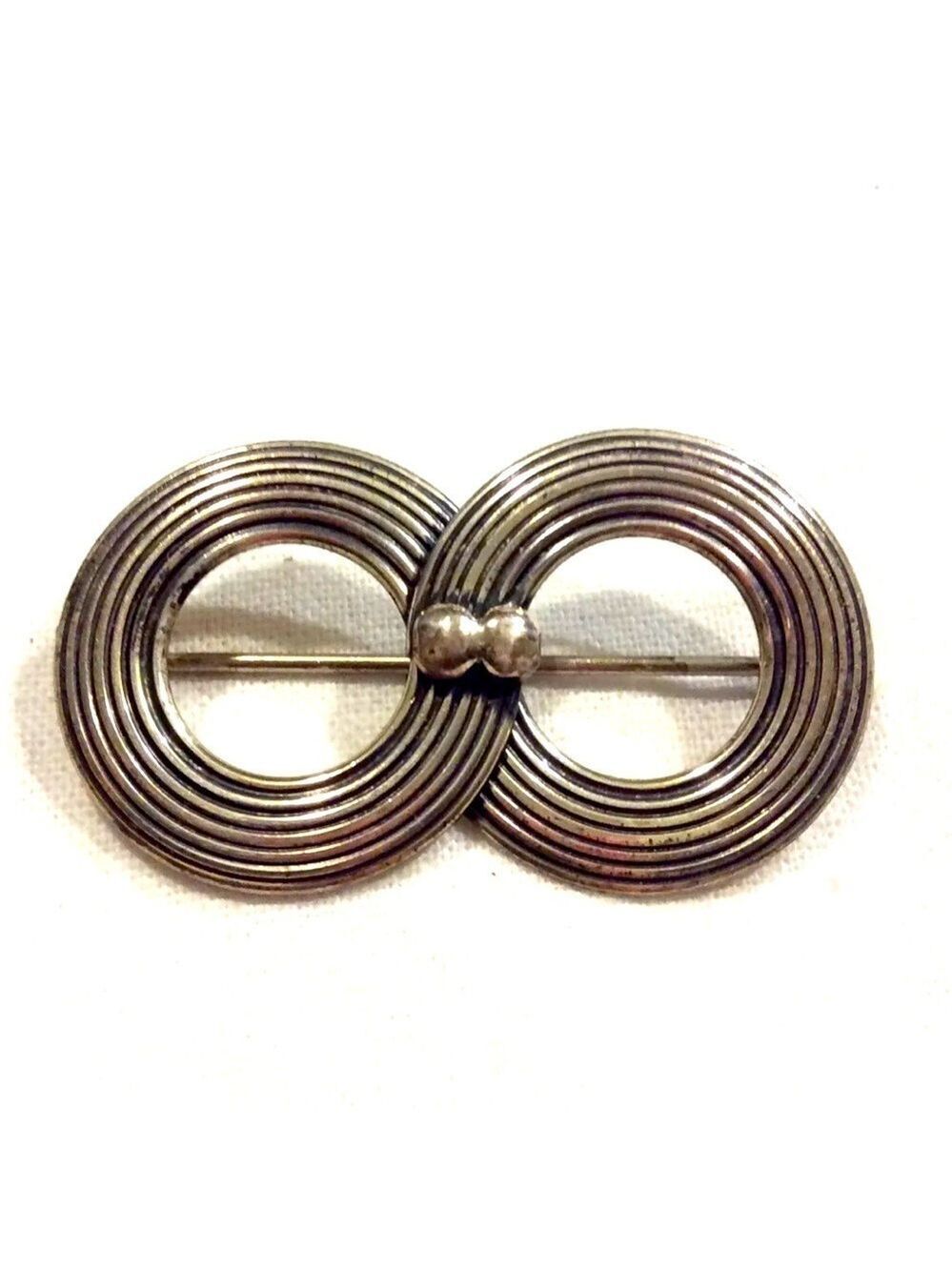 VINTAGE ART DECO STERLING SILVER BROOCH MID CENTURY INFINITY DESIGN